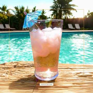 Ango soda on a poolside table.