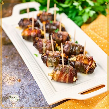 Medjool dates with goat cheese and almonds on a plate