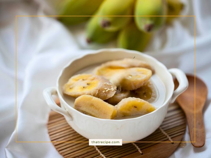 bowl of sliced bananas in coconut milk