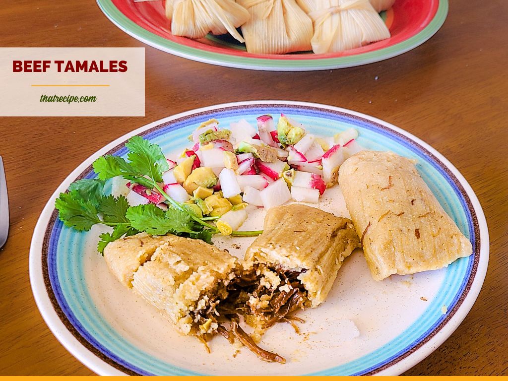 beef tamales on a plate with text overlay "beef tamales in the pressure cooker"