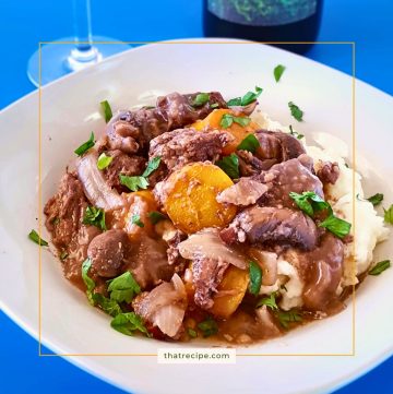 beef burgundy (boeuf bourguignon) over mashed potatoes