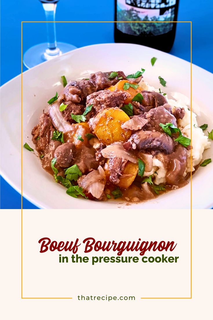 beef burgundy (boeuf bourguignon) over mashed potatoes