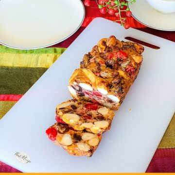 sliced loaf of cherry brazil nut bread