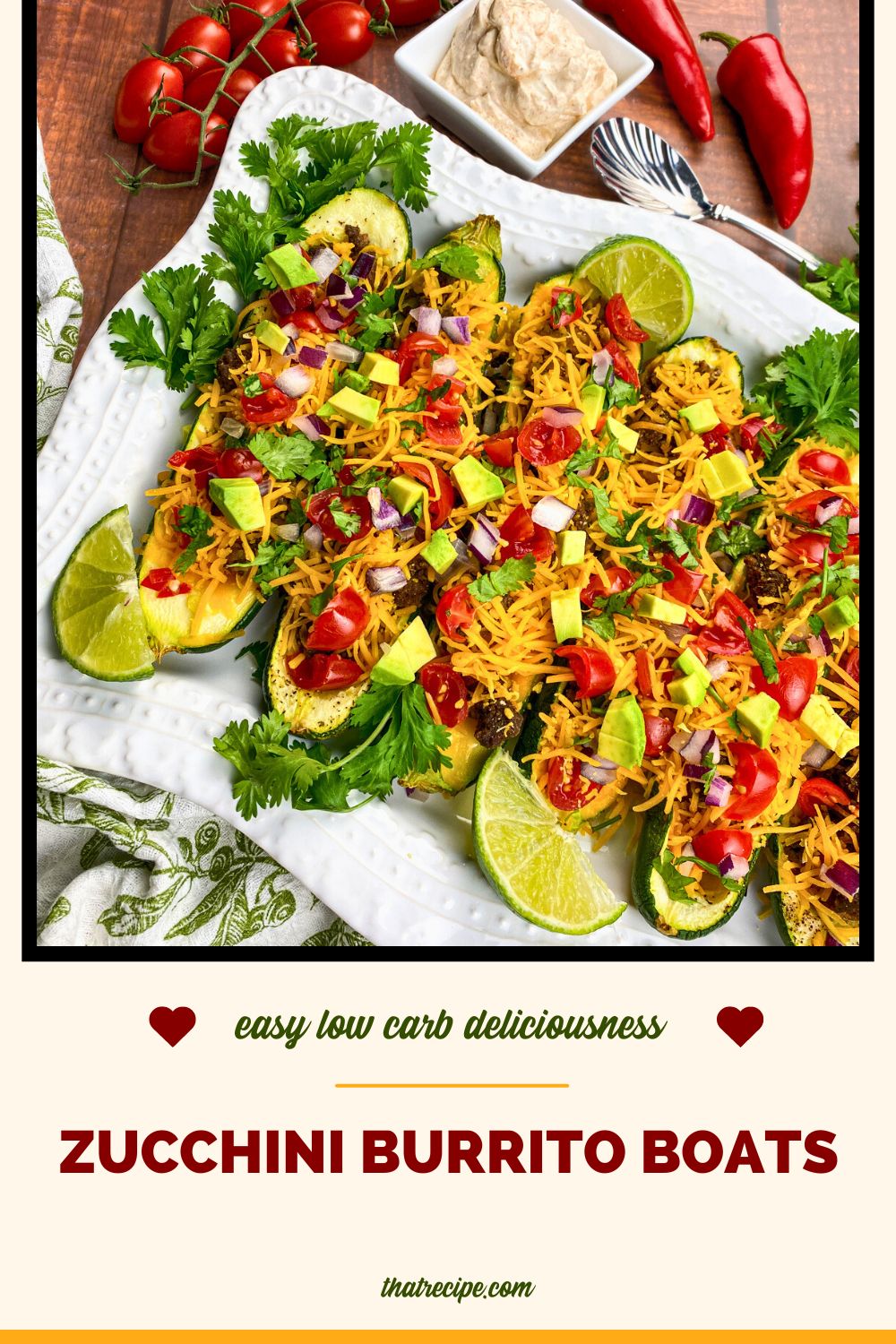 stuffed zucchini with ground beef, cheese, onion, avocado and tomatoes