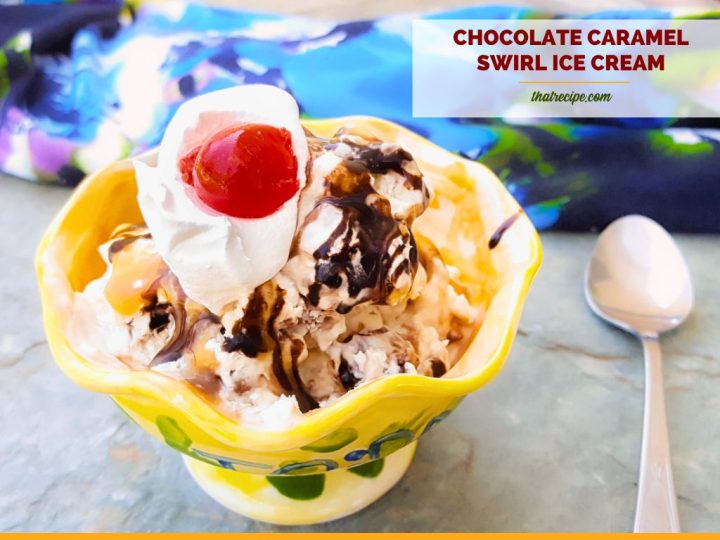 bowl of no churn sugar free caramel chocolate ice cream with whipped cream and a cherry on top.