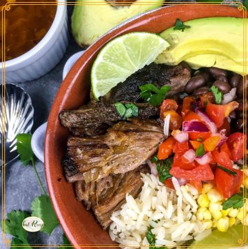 top down view of pork and rice bowl with text overlay "carnitas bowls in the pressure cooker"