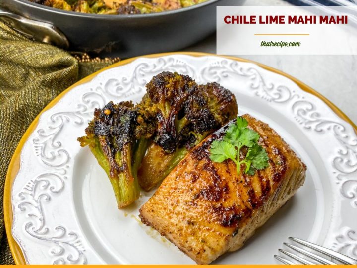 chile lime mahi mahi on a plate with blackened broccoli