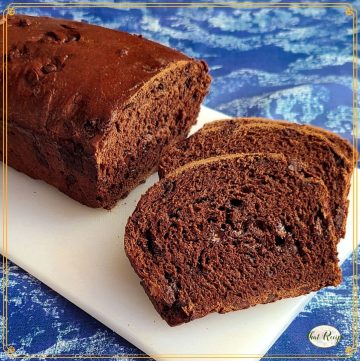 loaf of chocolate bread with chocolate chips with text overlay