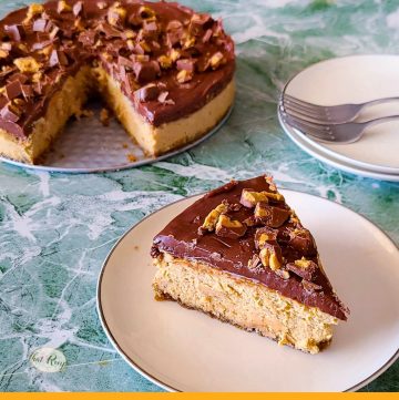 cheesecake slice on a plate with text overlay "chocolate peanut butter cheesecake"