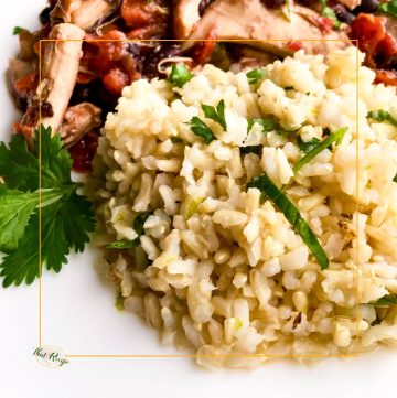 Cilantro lime rice on a plate with Mexican Chicken