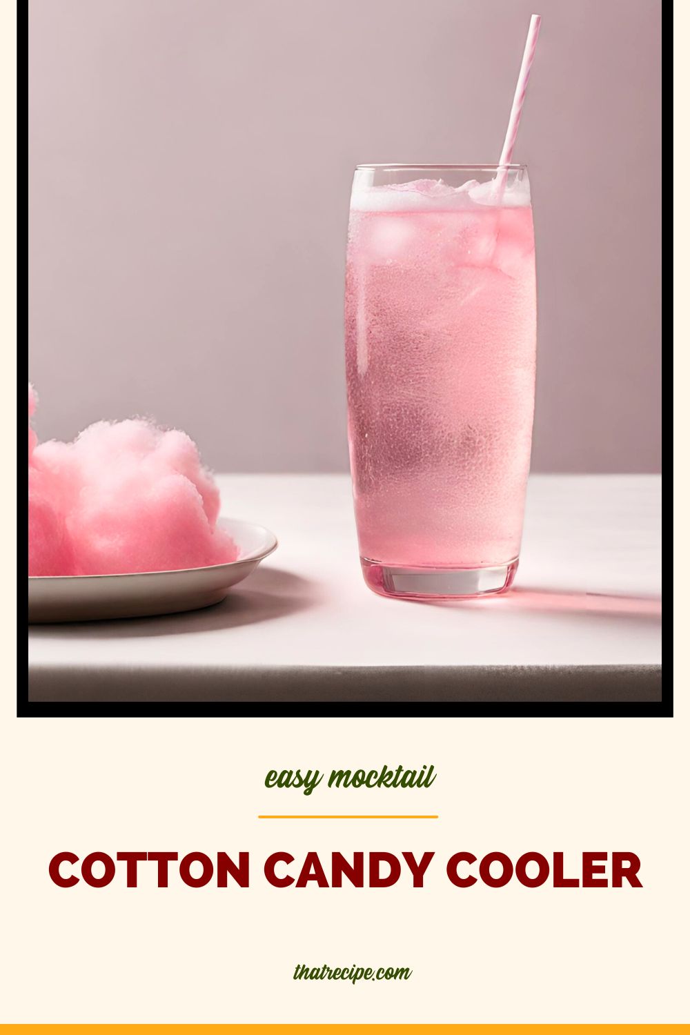 glass of sparkling pink drink with a plate of cotton candy