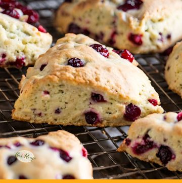 cranberry orange scones on a cooling rack