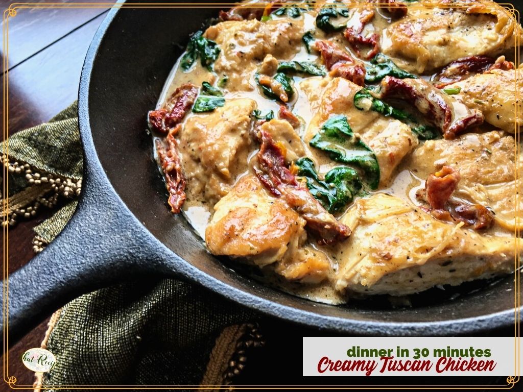 Creamy Tuscan Chicken in cast iron skillet.