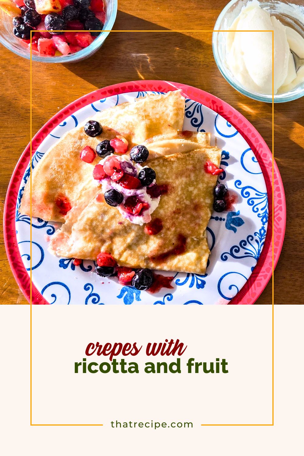 Crepes topped with berries and ricotta cheese