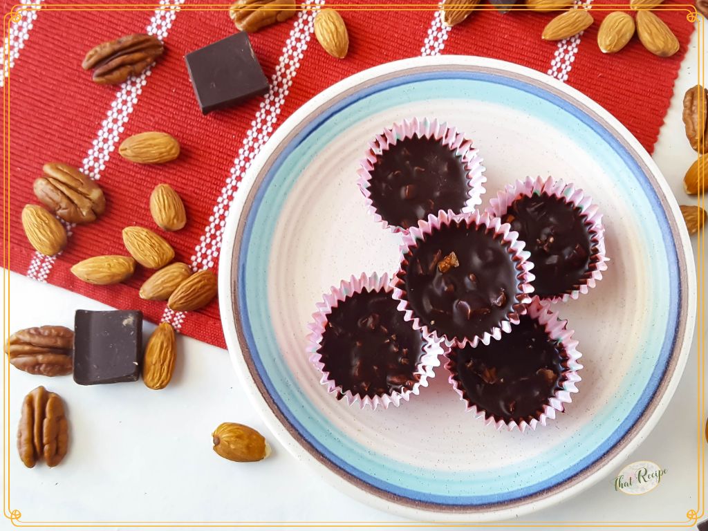 dark chocolate nut clusters on a plate