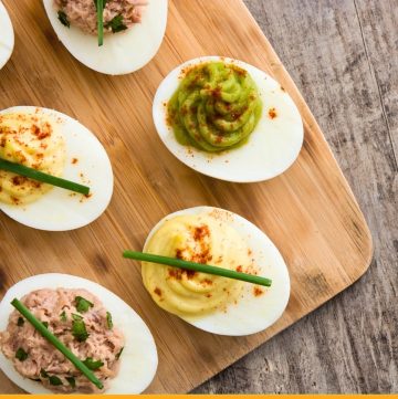 deviled eggs on a board