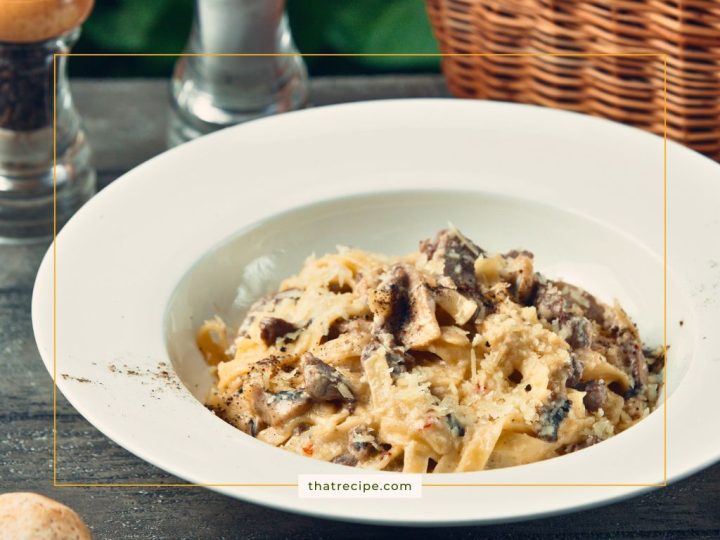 Fettucine with mushrooms and parmesan cheese in a bowl
