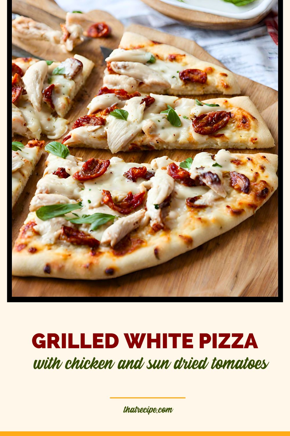 white pizza with chicken sun dried tomatoes and basil