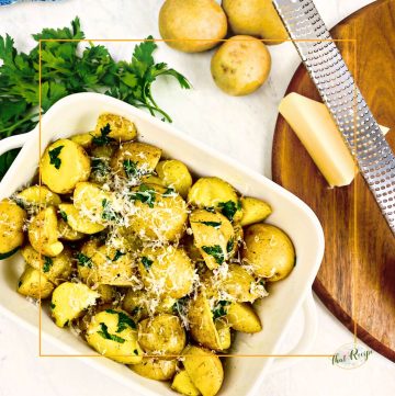 dish of baby potatoes with herbs and parmesan cheese