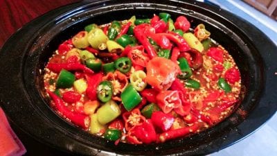 Homemade Hot Pepper Sauce made in a slow cooker. Perfect for holiday gift giving. #peppersauce #foodgifts