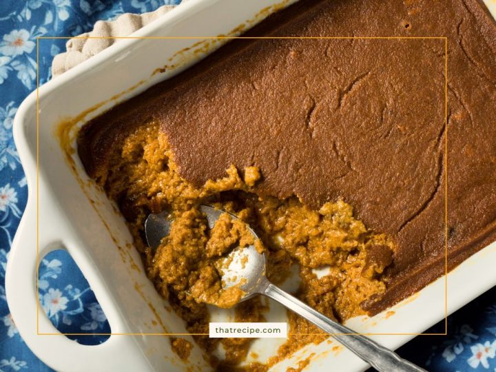 top down view of Indian Pudding in a baking dish. Cornmeal pudding, hasty pudding