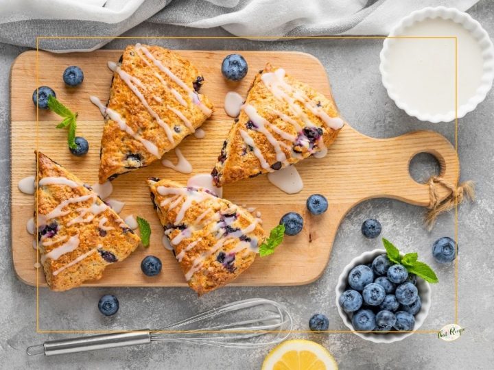 lemon blueberry scones on a cutting board