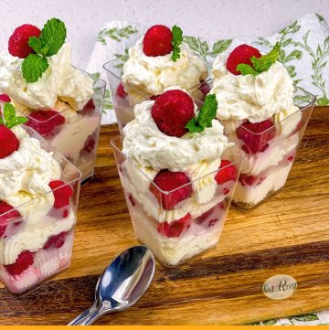 cheesecake cups with text overlay "lemon raspberry cheesecake cups"