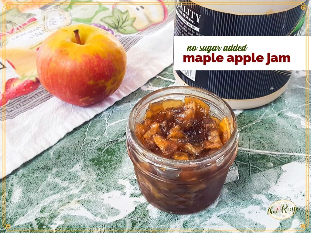 apple jam in a jar with maple syrup and apple and text overlay "no sugar added maple apple jam"