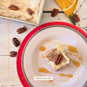 Frosted pecan blondies on a plate