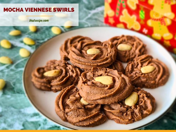 chocolate swirl cookies topped with almonds with text "mocha Viennese swirls"