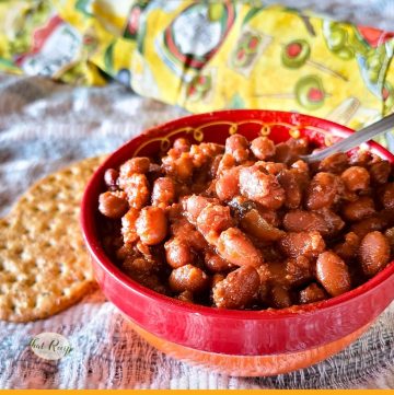 bowl of pork and beans with text overlay "Portuguese Beans with Linguica"