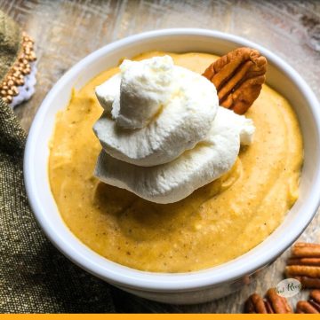 pumplin mousse in a lotus bowl with maple whipped cream.