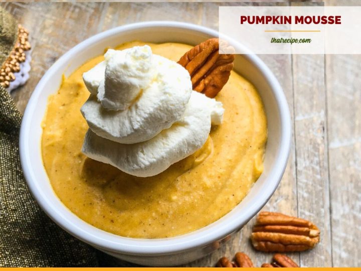 pumplin mousse in a lotus bowl with maple whipped cream.