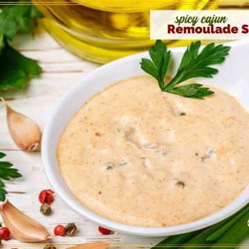 remoulade sauce in a white bowl with text overlay "Spicy Cajun Remoulade Sauce"