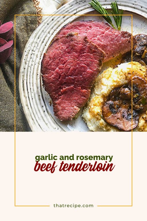 top down view of slice of beef with potatoes and mushrooms on a plate with text overlay "rosemary and garlic roasted beef tenderloin"