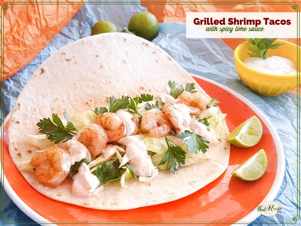 shrimp tacos on a bright background with text overlay "Grilled Shrimp Tacos with spicy lime sauce"