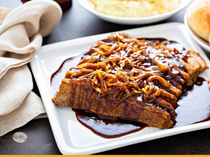brisket with mushroom and onion gravy on a plate
