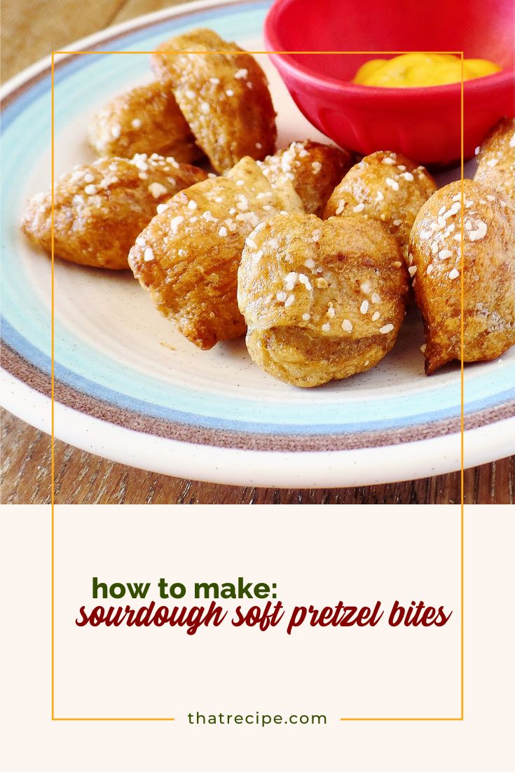 soft pretzel bites on a plate with mustard dip
