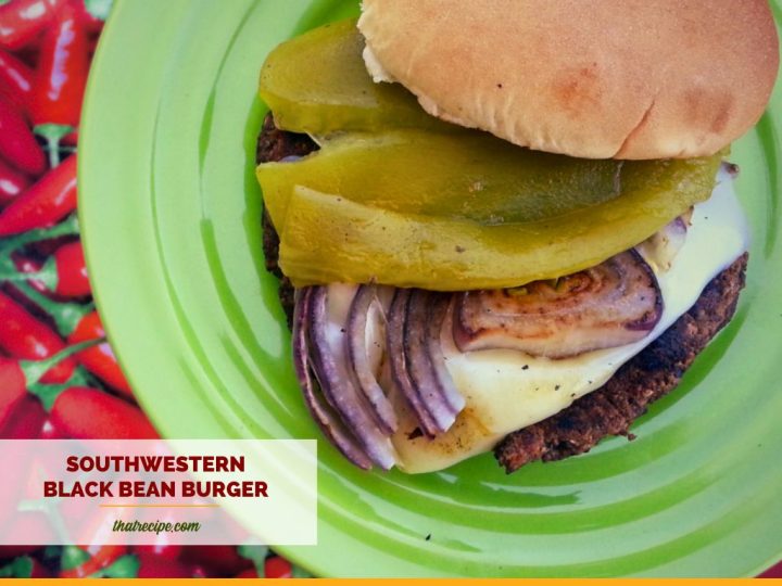 burger topped with chili and grilled red onion slice