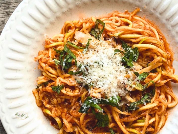 zucchini noodles with pasta sauce and parmesan