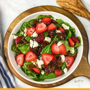 strawberry spinach salad in a bowl
