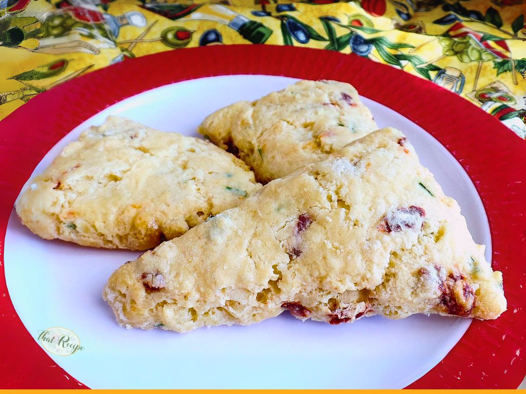 sun dried tomato and herb scones on a plate
