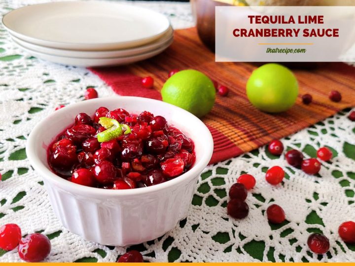 bowl of cranberry sauce on a table with text overlay "tequila lime cranberry sauce"