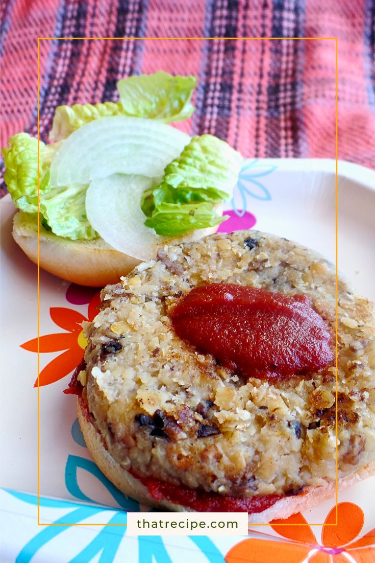 vegetarian burger on a bun topped with barbecue sauce