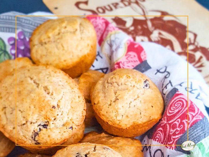 whole wheat sourdough muffins in a basket