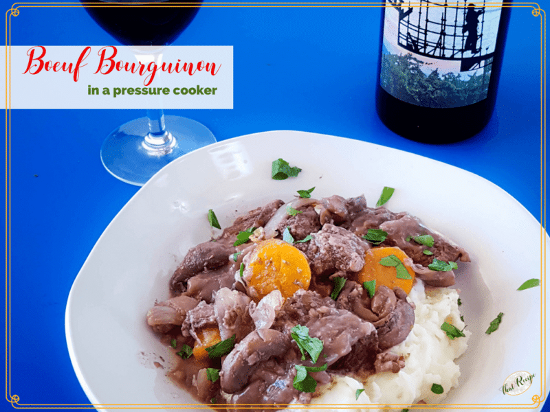 plate of beef burgundy. wine glass and bottle with text overlay